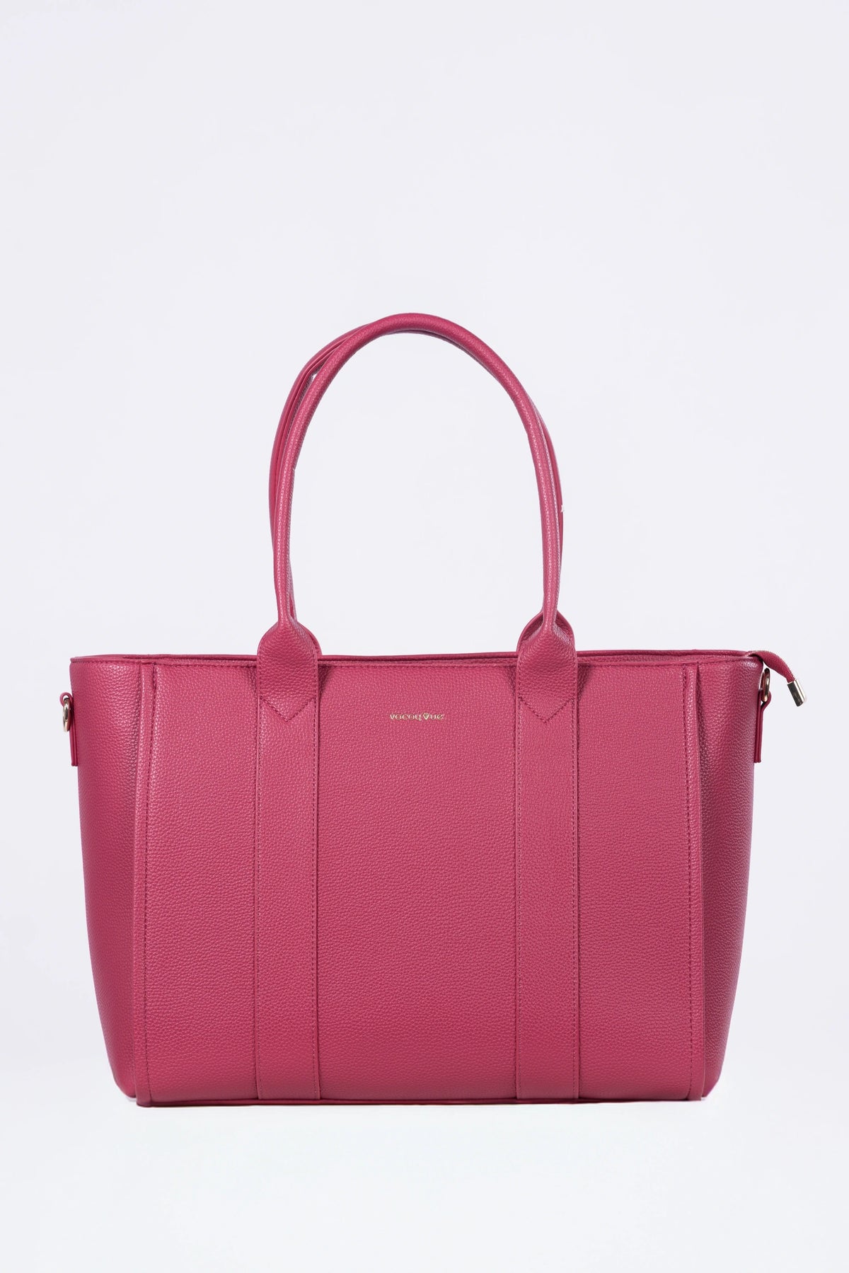 Pink handbag on a light purple background