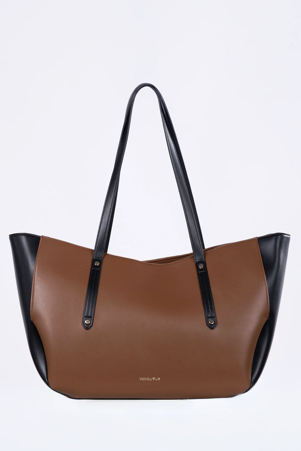 Brown handbag with black accents on a white background