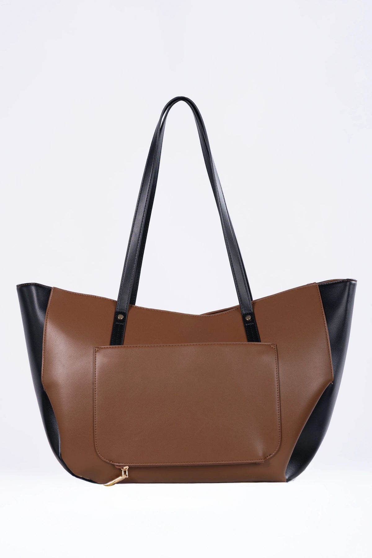 Brown and black handbag on a white background