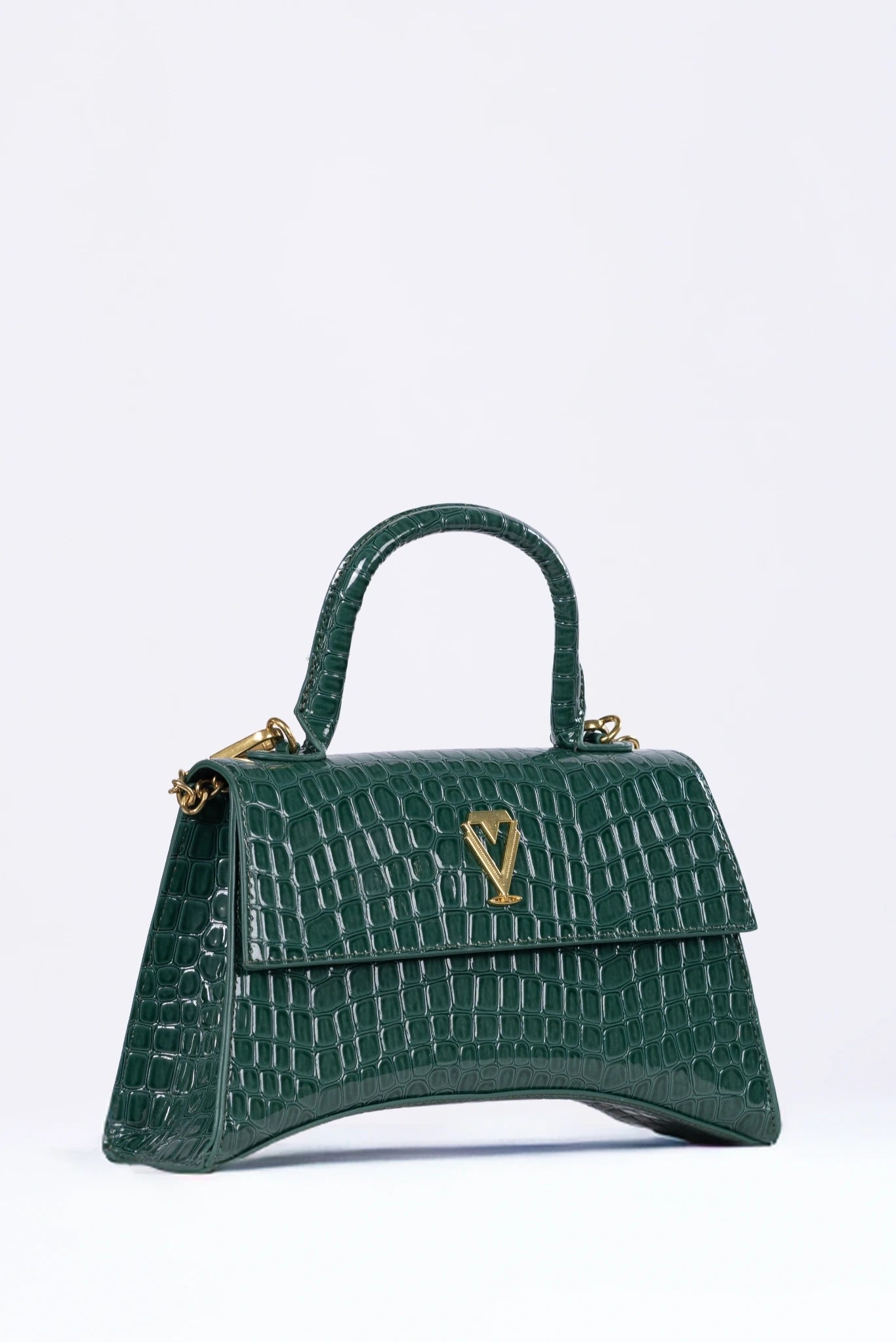 Green handbag on a white background