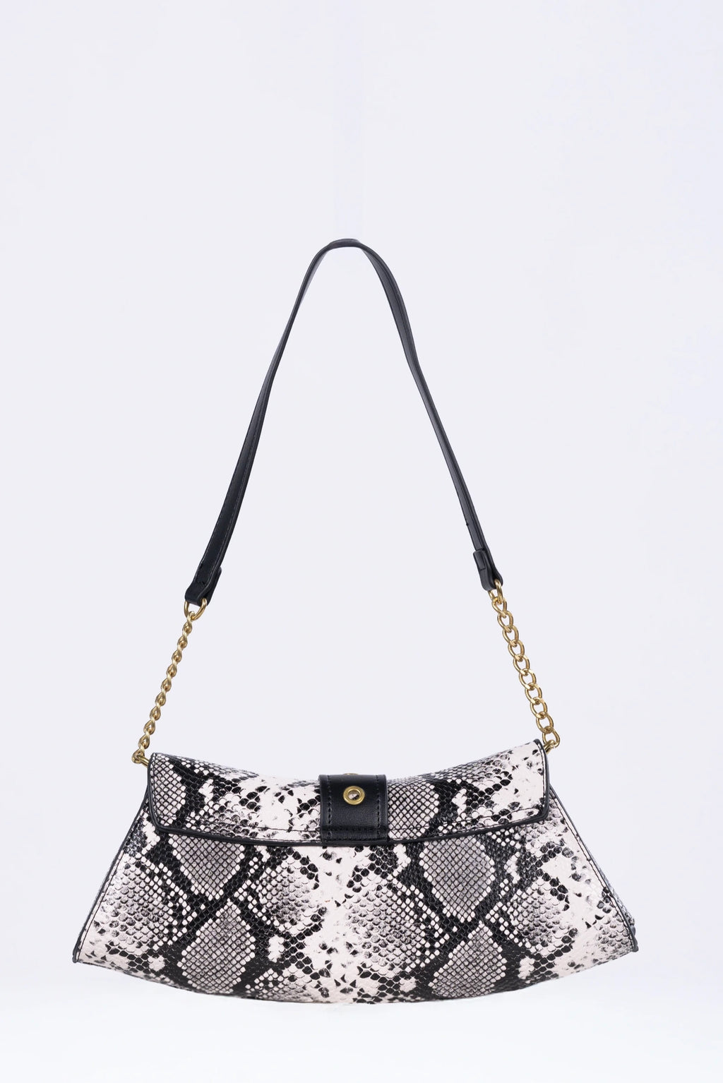 Snake print handbag with a black strap on a light gray background