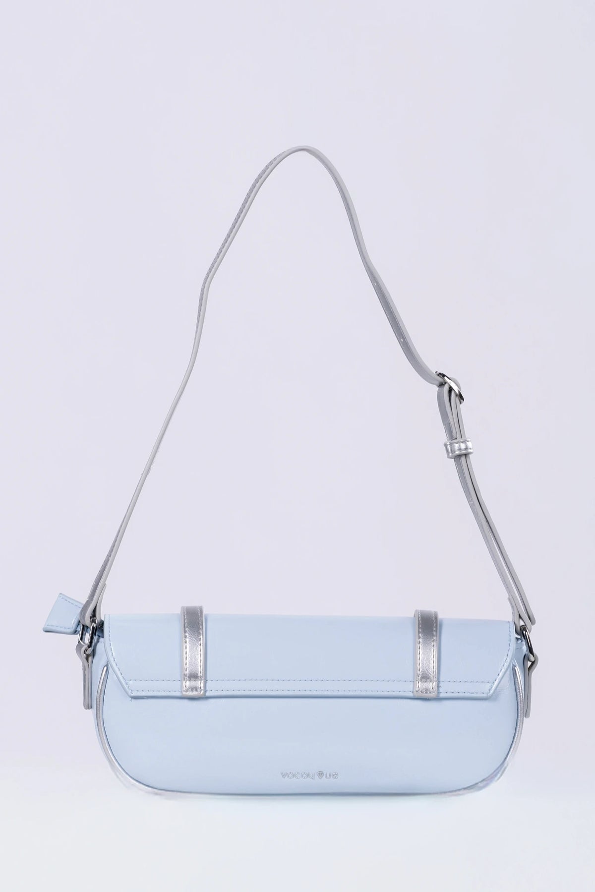 Light blue handbag with a strap on a light gray background