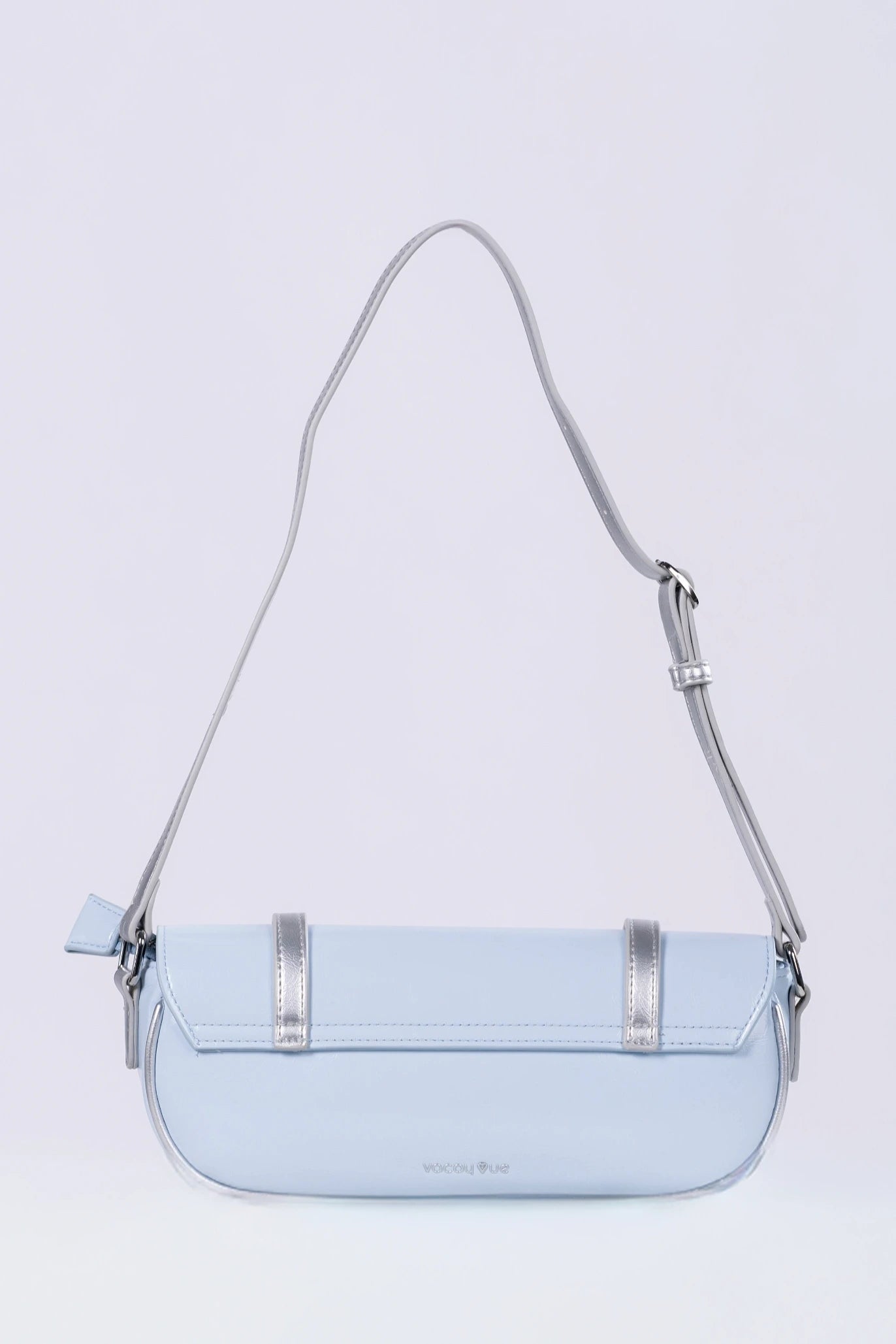 Light blue handbag with a strap on a light gray background